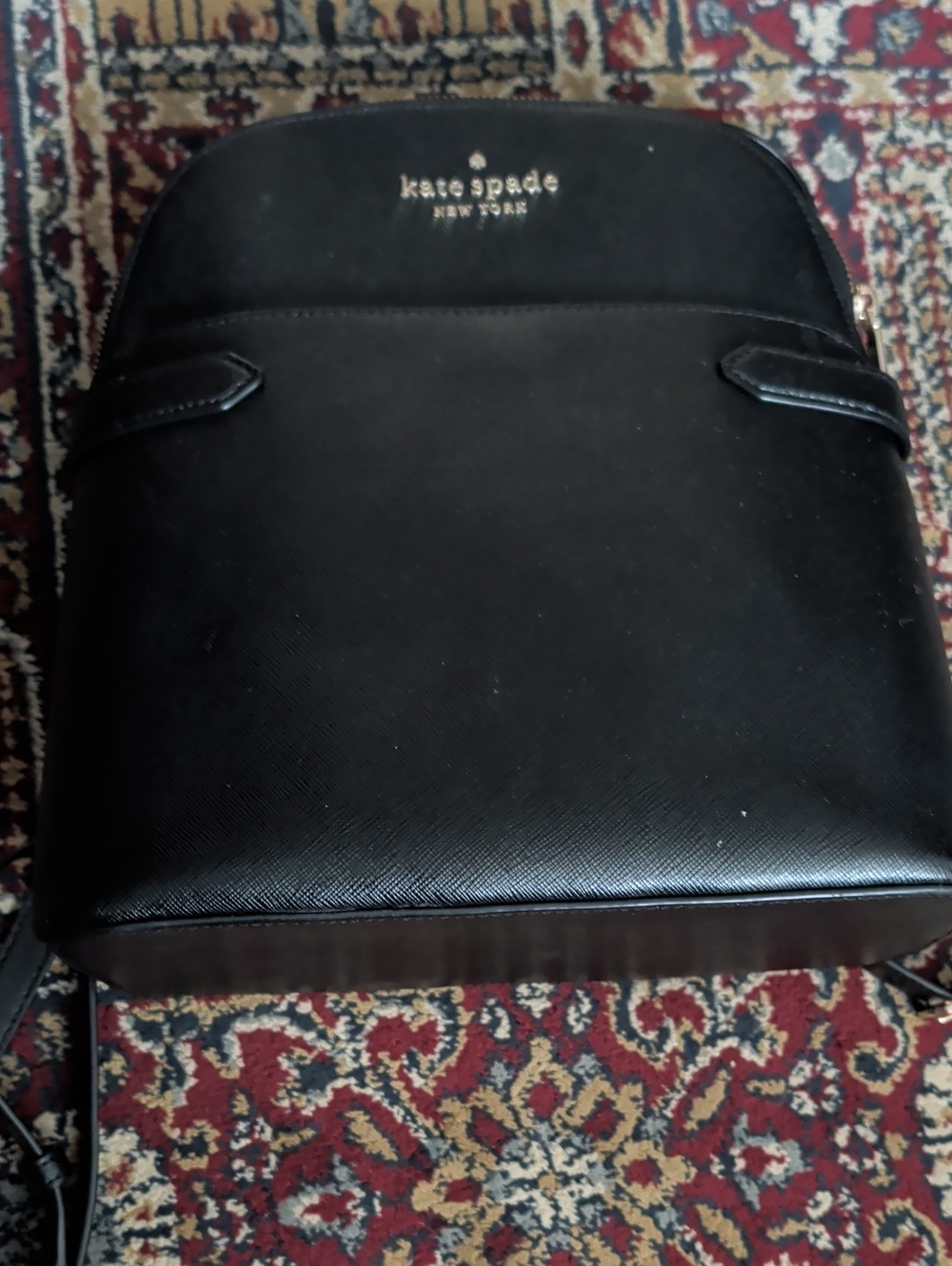 kate spade black leather backpack with gold logo